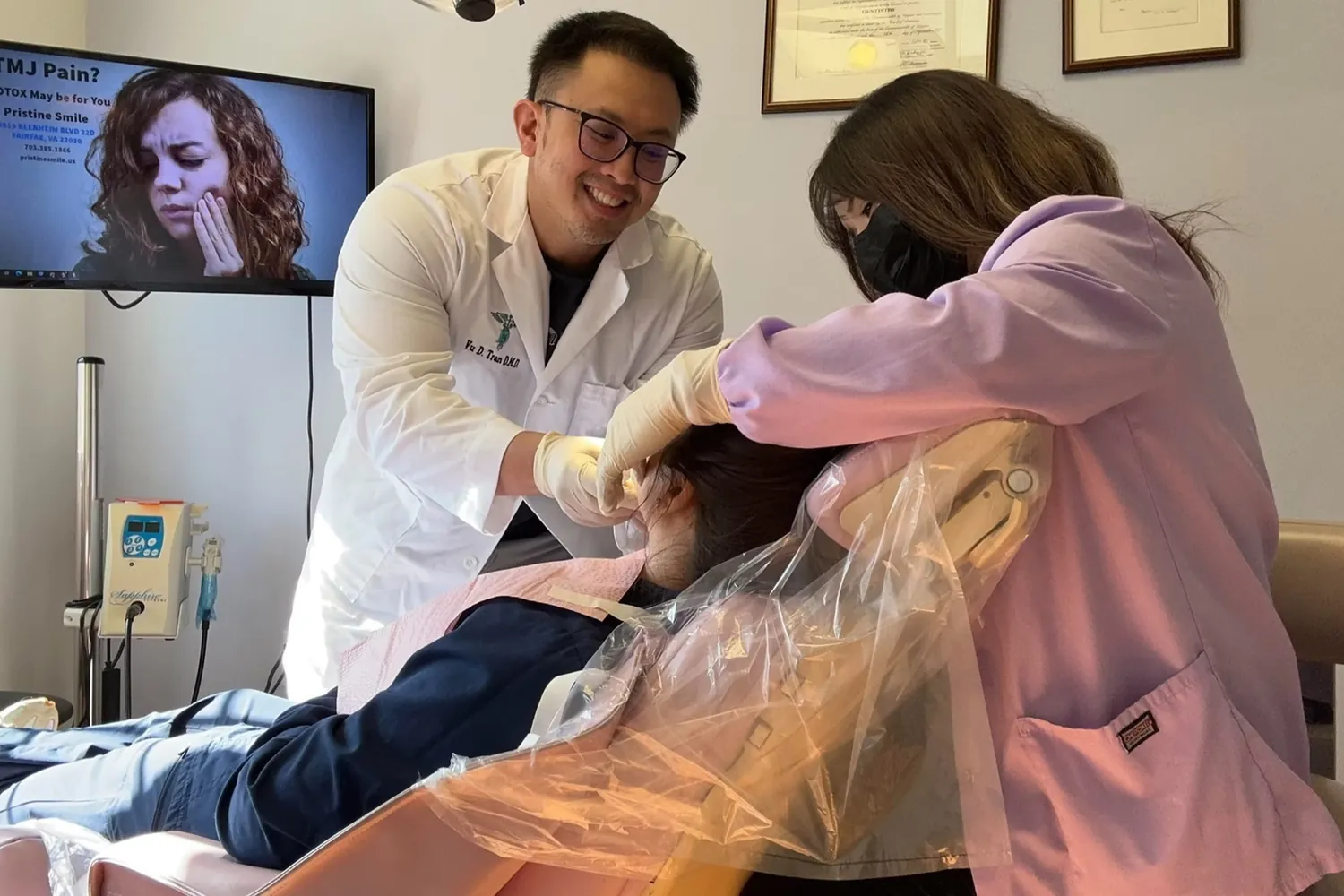 Dr. Vu D. Tran treating a patient at Pristine Smile Dental